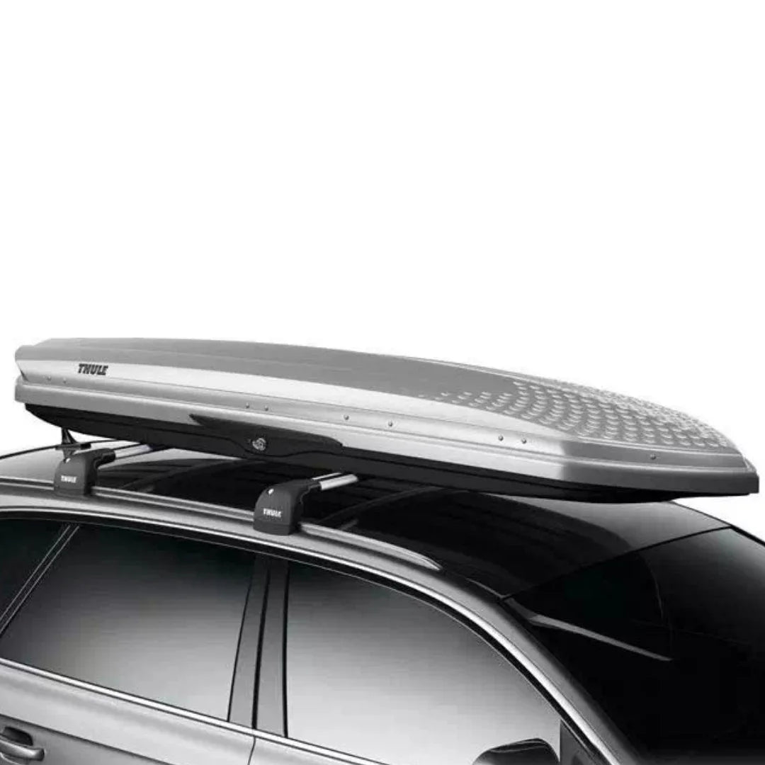 Thule Sonic silver cargo box mounted on roof rack, angled side perspective