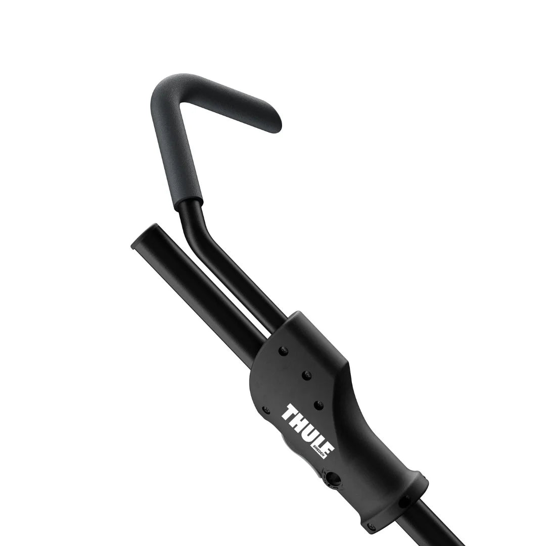 Detailed close-up of the ratcheting arm that secures the front wheel of the bike.