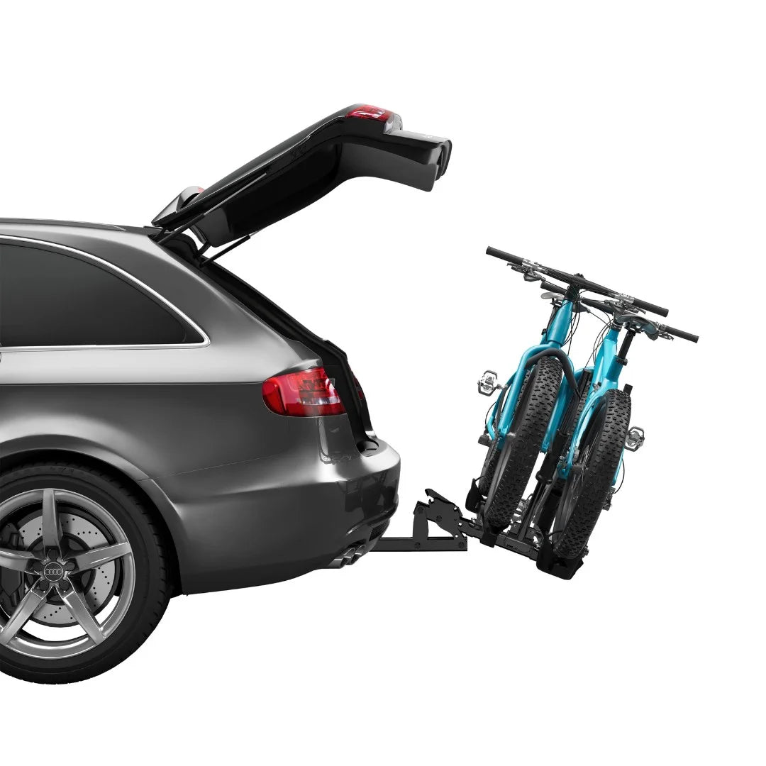 The rack tilted downward to allow trunk access while bikes are still mounted.