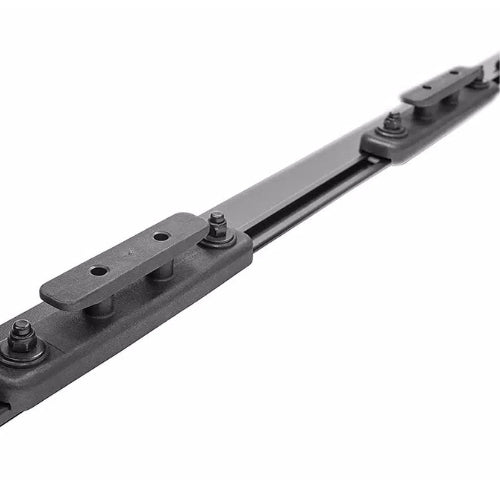 Close-up of Truxedo Elevate TS Rails aluminum T-slot track with mounting hardware and tie-downs