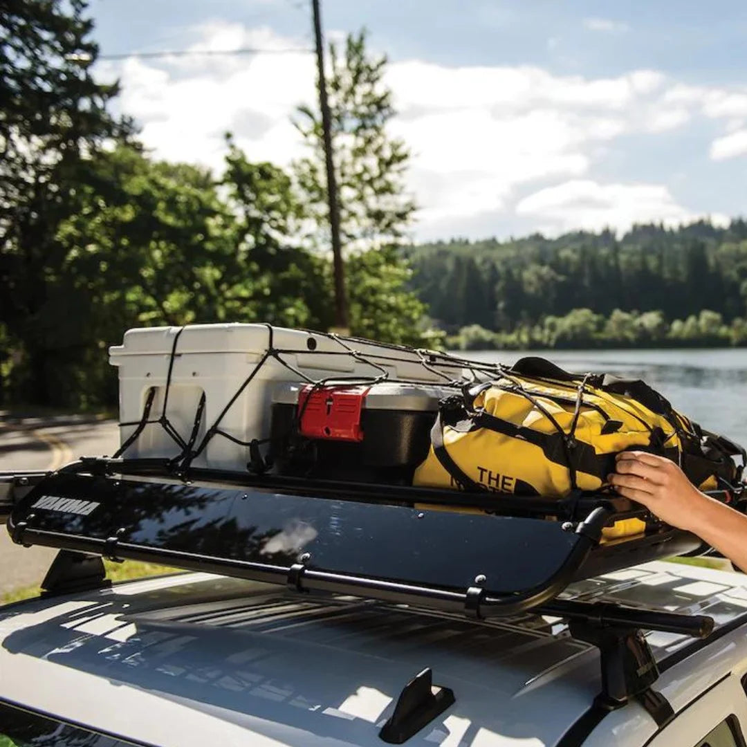 Yakima OffGrid Cargo Basket on tip of car parked at lake