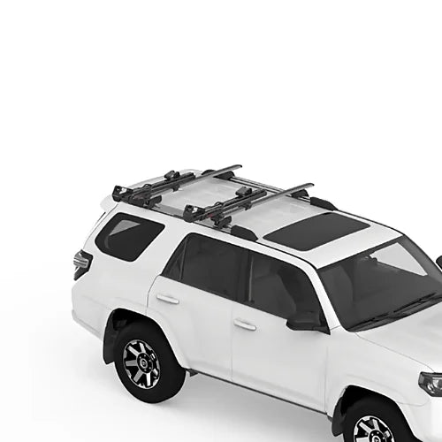 Yakima ShowDown folded flat on SUV roof rack for reduced wind drag when not in use.