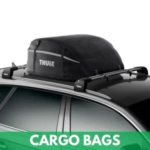 Thule waterproof roof cargo bag mounted on car crossbars for travel storage