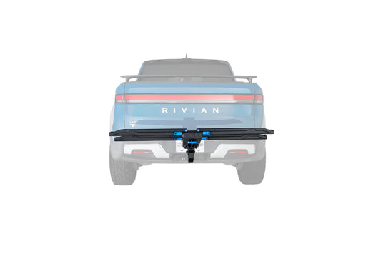 Rivian vehicle rear end with visible branding on a white background