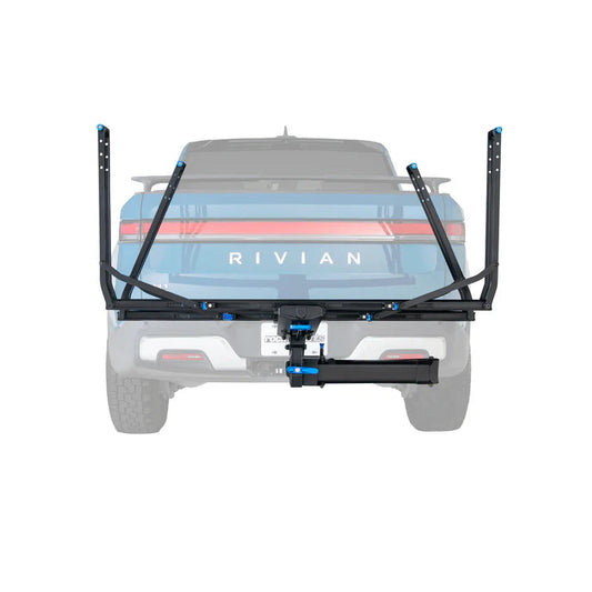 Rear view of a Rivian vehicle with a bike rack on a white background