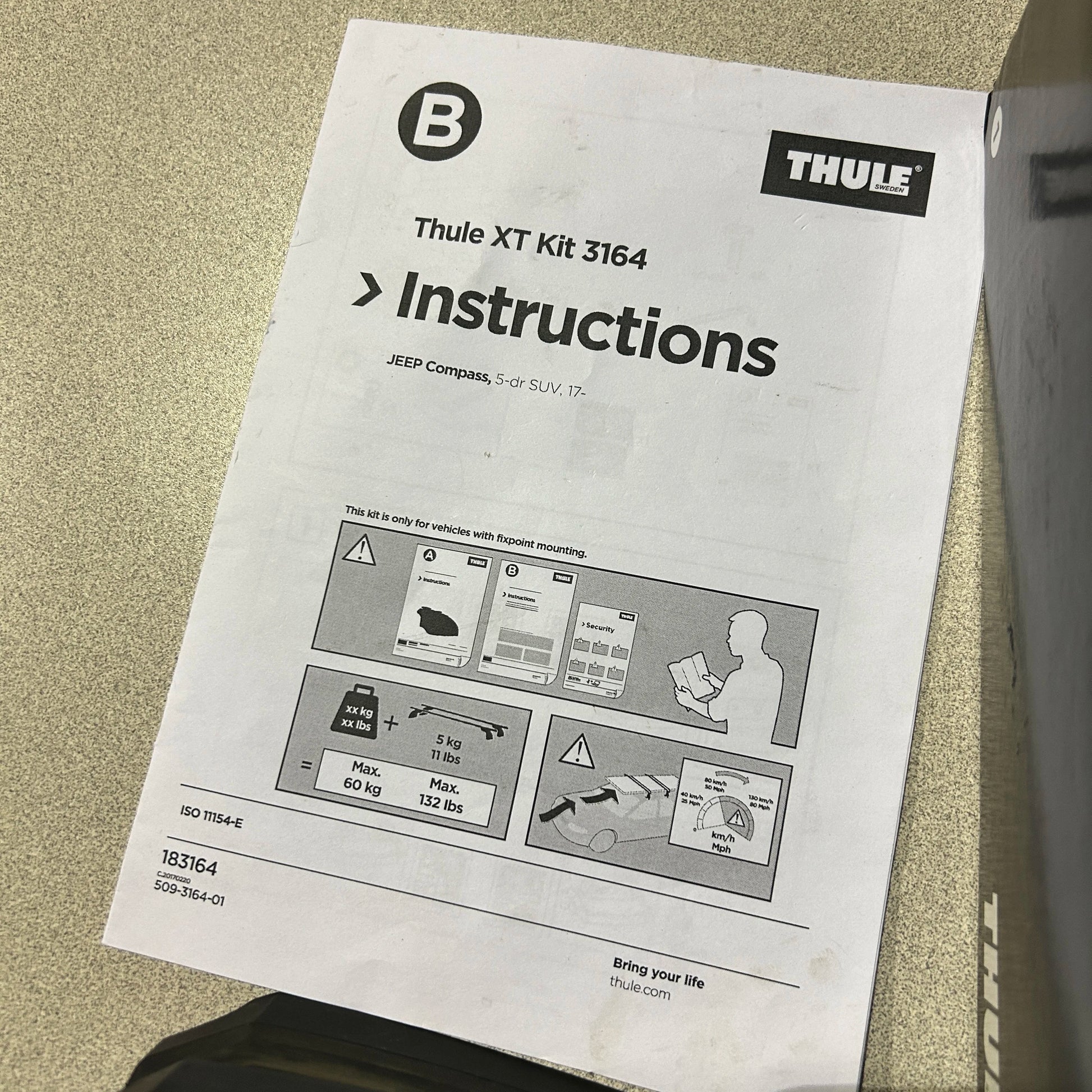 Open Thule instruction manual for Fit Kit 3164