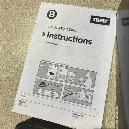 Open Thule instruction manual for Fit Kit 3164