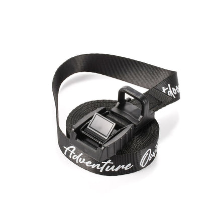 Black Adventure Outdoors cam buckle strap coiled with buckle on top
