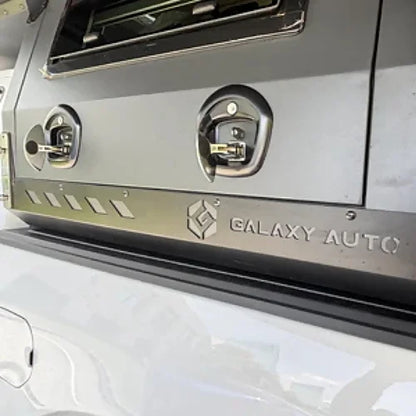 Close-up view of latches and panel hardware on 4th Gen truck camper