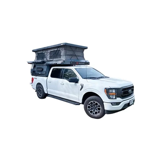 Side profile view of 4th Gen truck camper installed on pickup truck