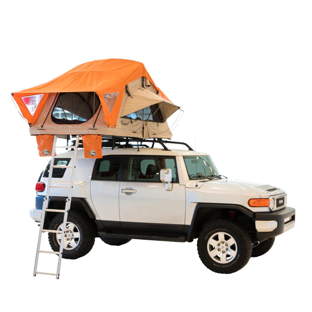 Orange Treeline Joshua rooftop tent mounted on white SUV with ladder extended