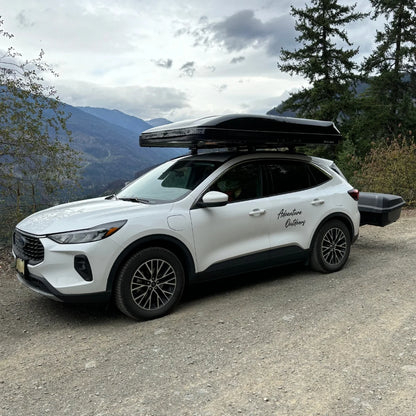 ABS Wedge Clamshell Rooftop Tent foldet on car in mountains