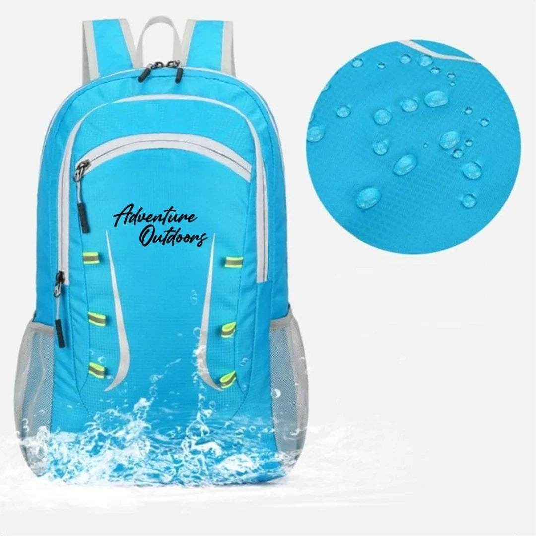 Bright blue Adventure Outdoors foldable hiking backpack with water splash and waterproof material close-up
