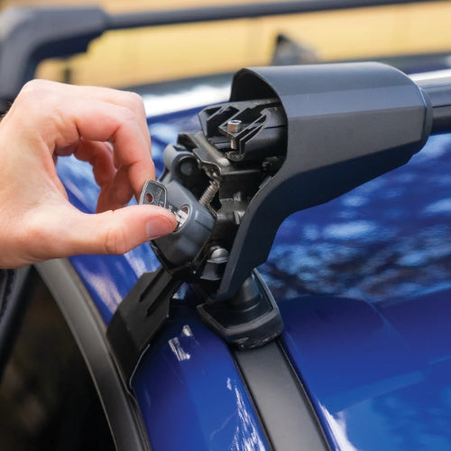 Person adjusting a car wiper on a blue vehicle