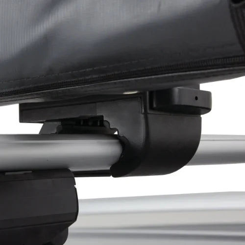 Close-up of OverNOut roof rack awning tool-free mounting hardware attached to roof rack crossbar