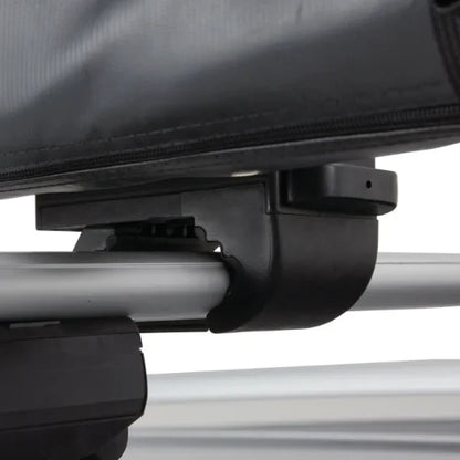 Close-up of OverNOut roof rack awning tool-free mounting hardware attached to roof rack crossbar