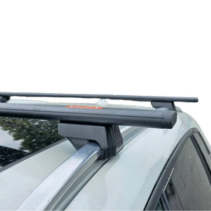 Car flush rail roof rack system on a white car with a clear background