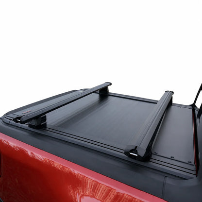 Black roof rack on a red vehicle with a white background