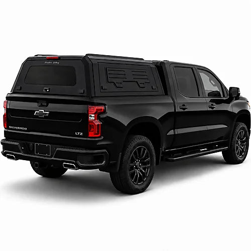 GullWing aluminum truck cap with tinted rear glass and lockable side doors on an overland pickup truck