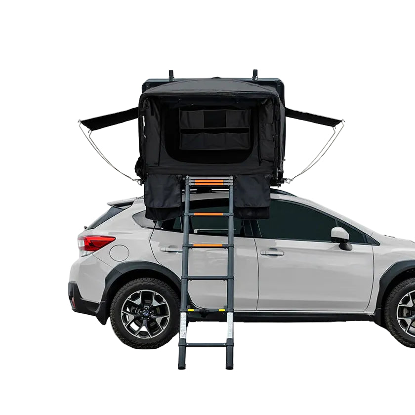 Condor 2 Air hard shell rooftop tent opened on a vehicle with ladder deployed and side awnings extended.