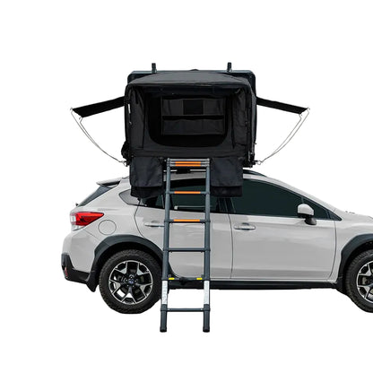 Condor 2 Air hard shell rooftop tent opened on a vehicle with ladder deployed and side awnings extended.