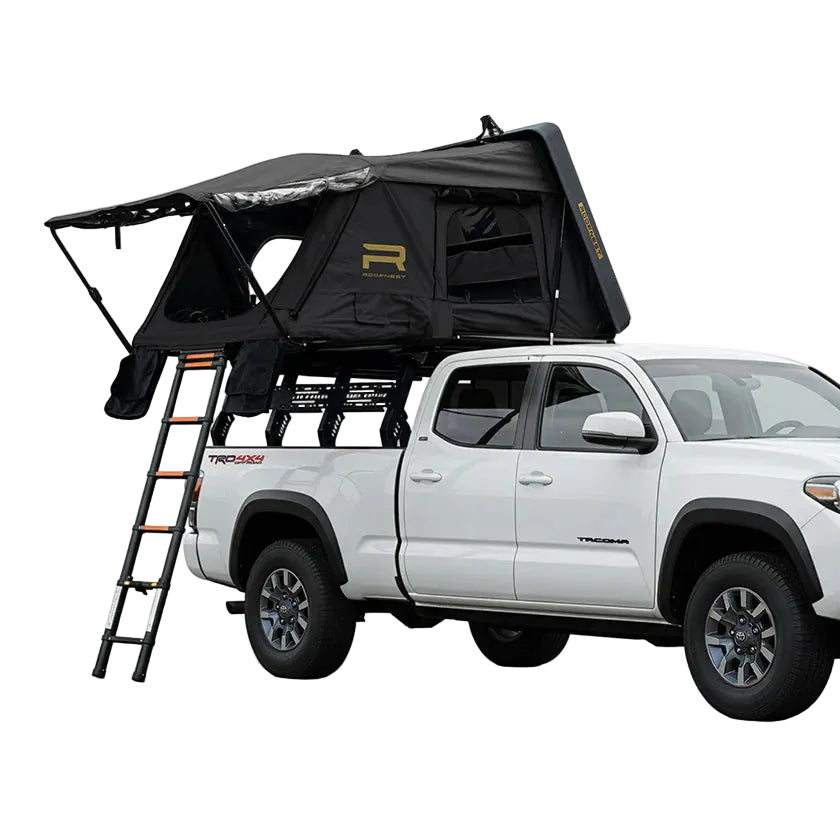 Black Condor 2 XL Air rooftop tent opened on a pickup bed rack with ladder deployed and window awnings extended.