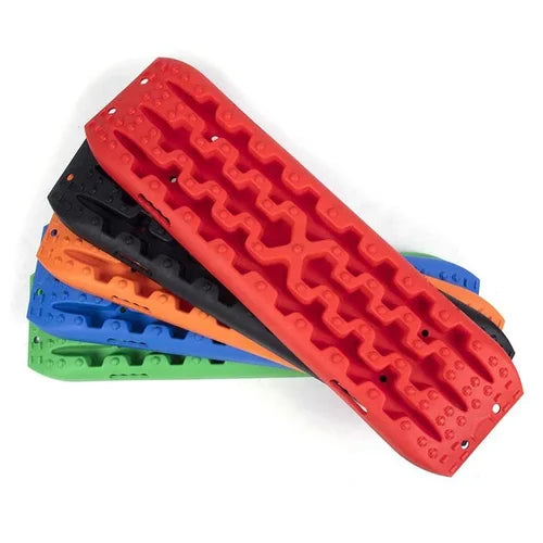 Coloured traction recovery boards shown from above on a white background.