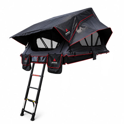 Taiga Hybrid Folding Rooftop Tent open on a black SUV with ladder extended in a wooded outdoor setting.