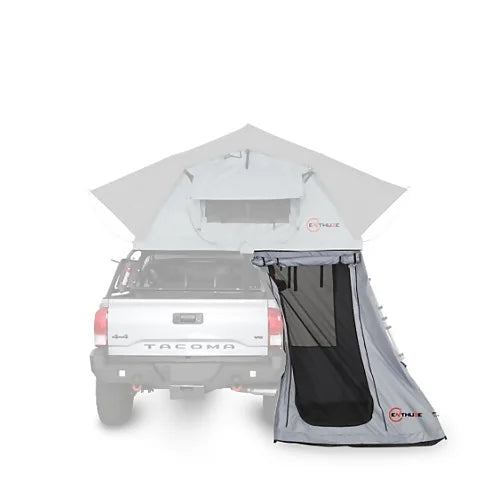 Enthuze Annex Room for Rooftop Tent with large side door access, mosquito netting, and privacy flaps attached to pickup truck