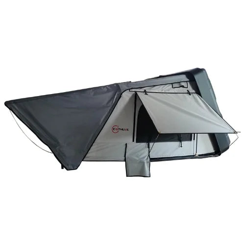 Camping rooftop tent with attached awning on a white background