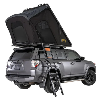 Falcon 3 EVO XL Air hard shell rooftop tent opened on a vehicle with ladder deployed.