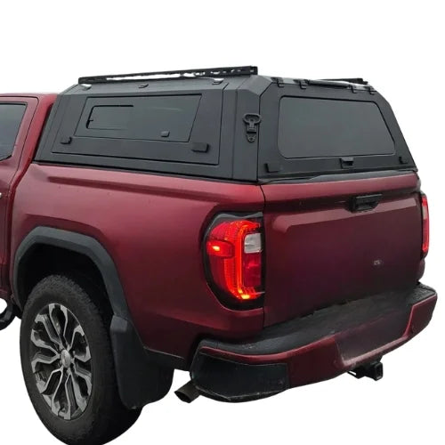 gmc canyon gullwing aluminum truck cap and truck canopyon a red gmc canyon