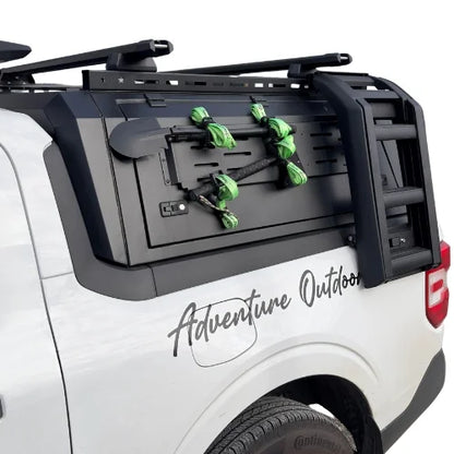 ford maverick gullwing aluminum truck cap and truck canopy on a white ford maverick with roof racks on canopy and side ladder with Adventure Outdoors branding