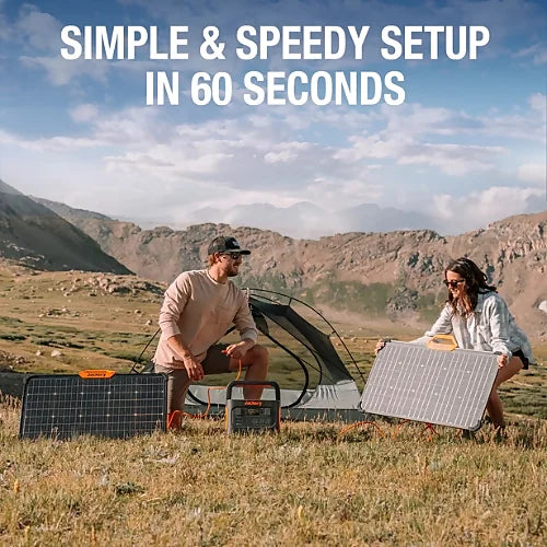 Couple setting up Jackery SolarSaga 80W portable solar panels with Jackery power stations for camping outdoor energy in 60 seconds