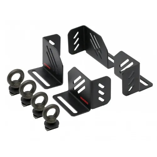 Set of black metal brackets and rings on a white background