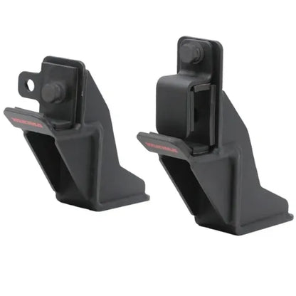 Two black vehicle mount brackets on a white background