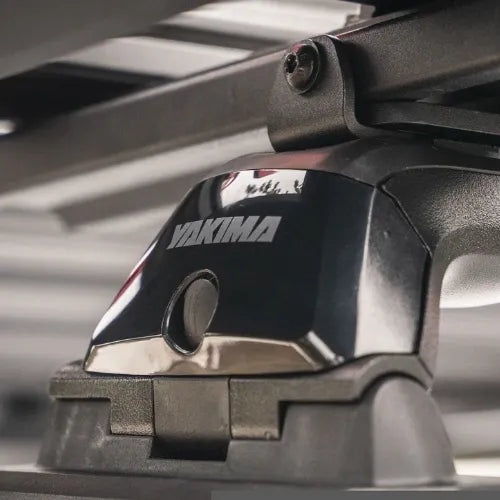 Yakima roof rack system on a vehicle with a blurred background