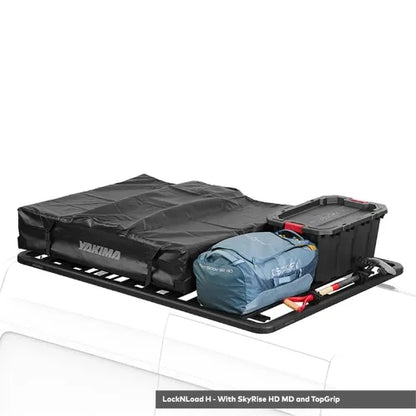 Yakima LockNLoad H roof rack system with bags and containers on a white background