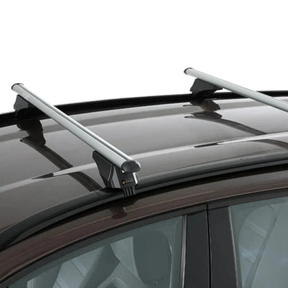 Angled view of Modula Smart Bar installed across roof rails on a dark car.