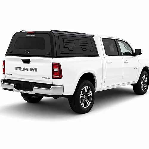 GullWing aluminum truck cap with tinted rear glass and lockable side doors on an overland pickup truck