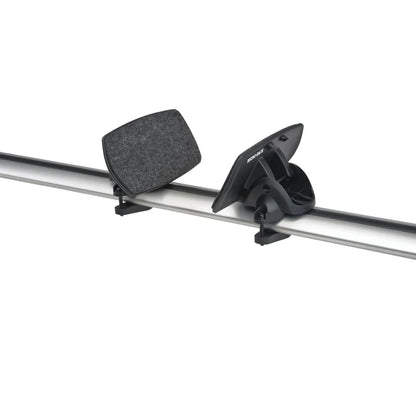 Angled view of rear felt-covered cradles from the Rhino-Rack Nautic 571 kayak carrier attached to roof crossbars.