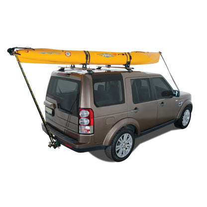Vehicle with a yellow kayak loaded onto the Rhino-Rack Nautic 571 rear-loading carrier on the roof.