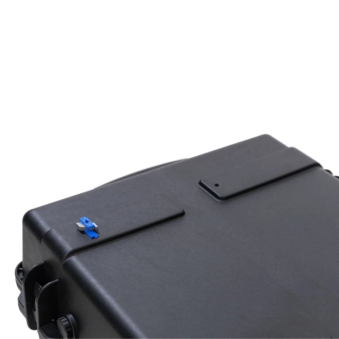 Blue latch pin securing the Rhino-Rack Cargo Case.