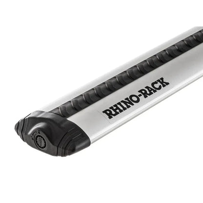 Close-up of a silver Rhino-Rack Vortex roof bar featuring the black VGS rubber strip and branded end cap.
