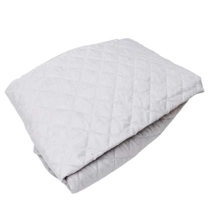 folded silver quilted insulation liner for rooftop tents on a white background