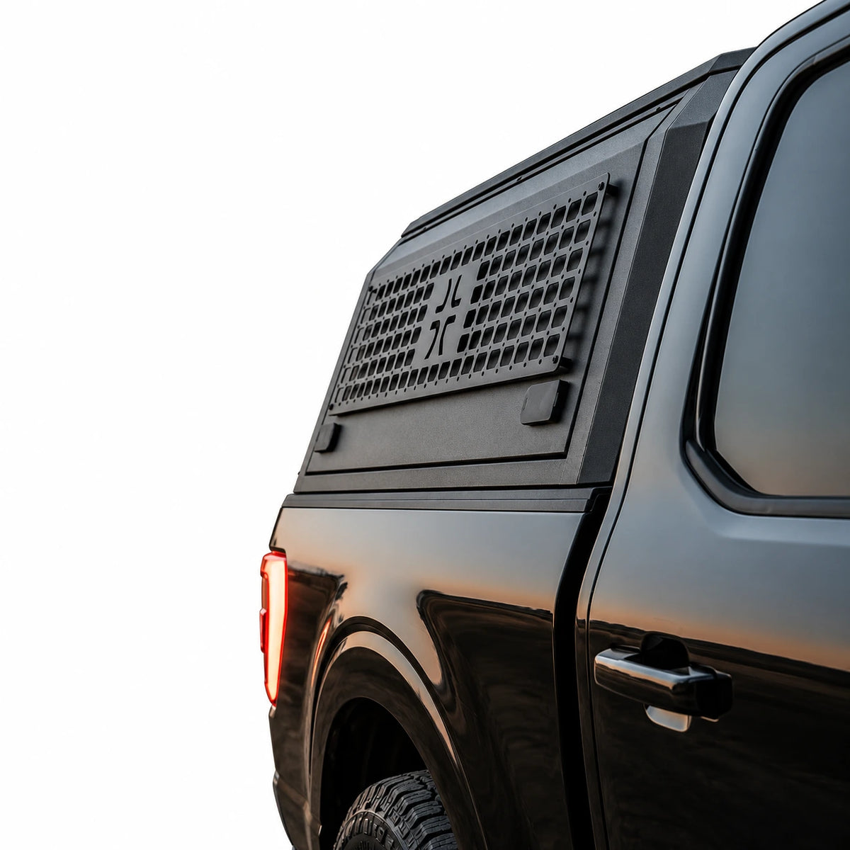 atlas expedition grid truck topper with side molle panel gullwing door from front passenger quarter view and molle panels displayd