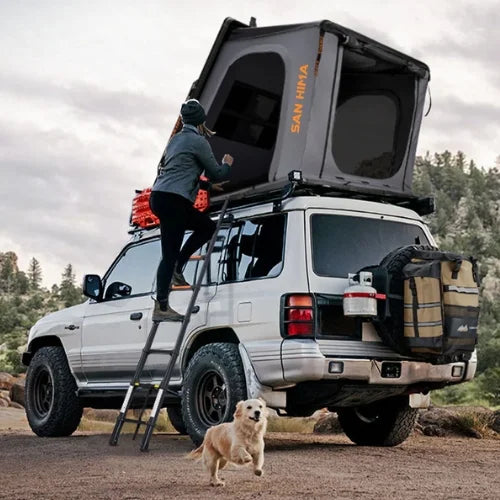 San Hima Hotham Aluminum Rooftop Tent - Lightweight Triangle RTT grey colour being used on a camp site