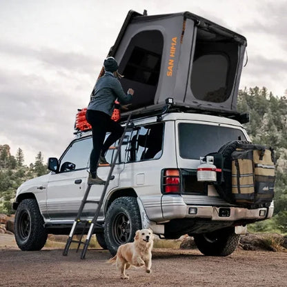 San Hima Hotham Aluminum Rooftop Tent - Lightweight Triangle RTT grey colour being used on a camp site