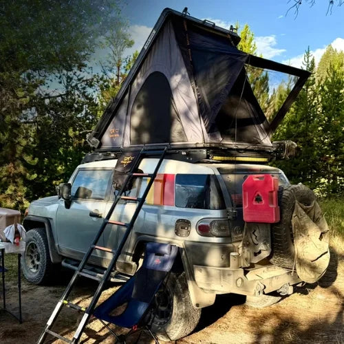 San Hima Hotham Lite Aluminum Rooftop Tent - Lightweight Slim Clamshell Tent grey colour being used on a camp site