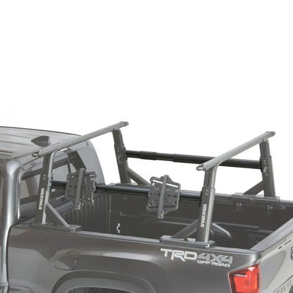 Bed rack system on a truck bed with 'TRD 4x4' branding.